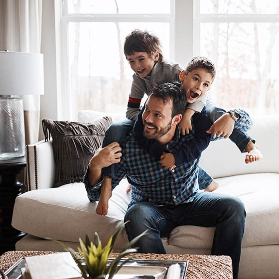 Man playing with children